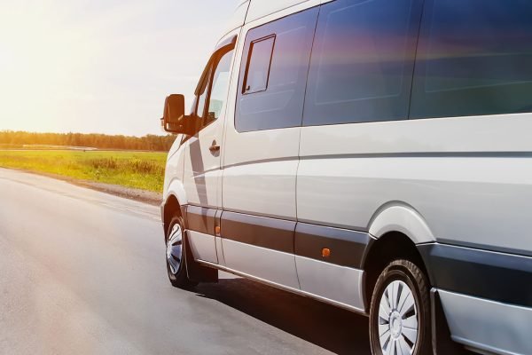 minibus traveling safely on motorway